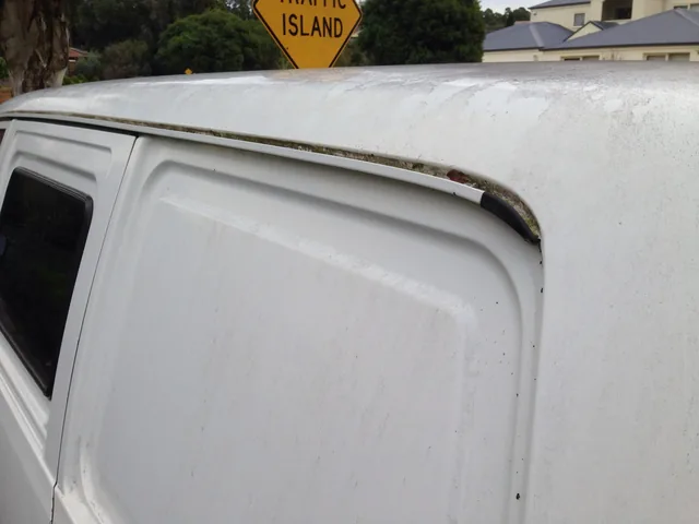 Contamination along the roof of a white van